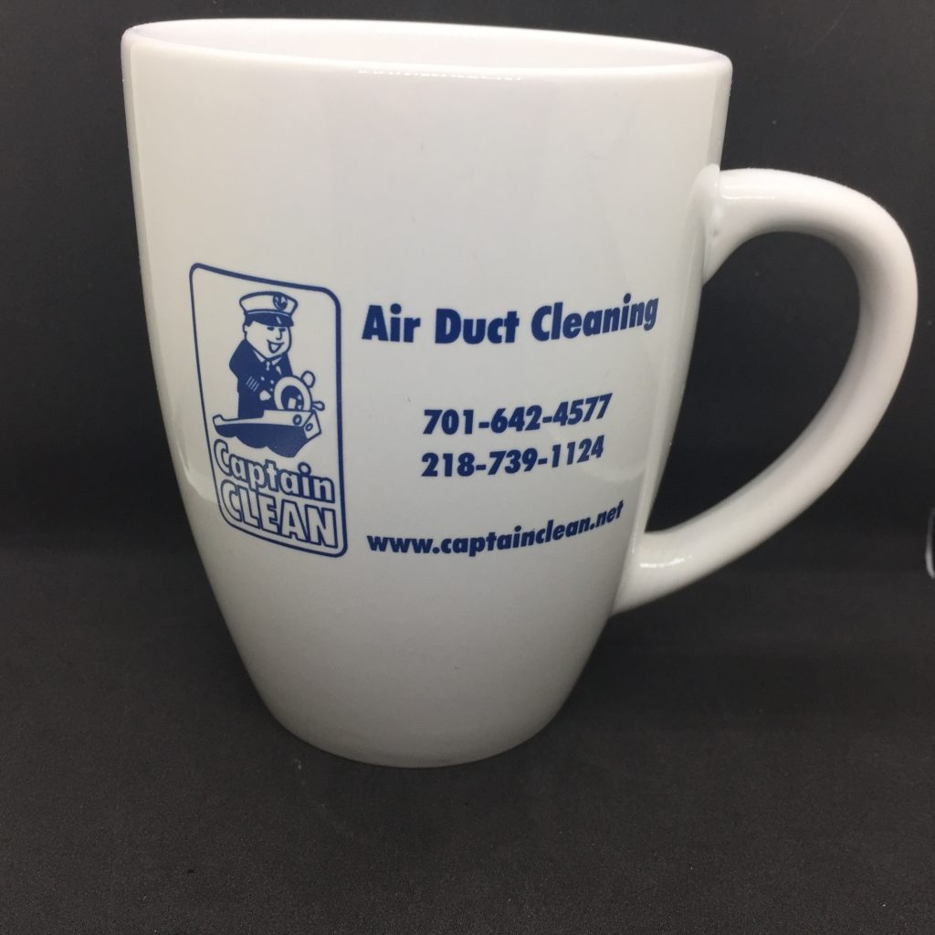 Picture of a mug with the Captain Clean logo and contact information on it.